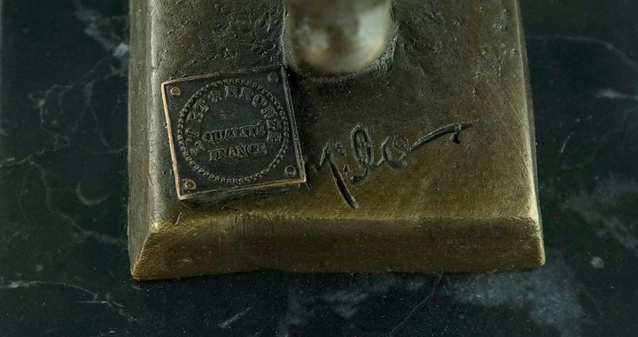 Bronze sculpture of a voluptuous female nude dancing freely