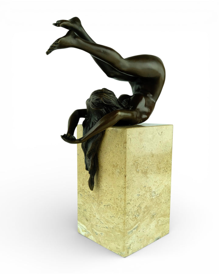 Bronze sculpture of a female in flowing pose