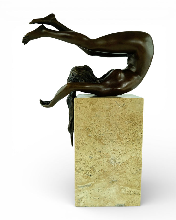 Bronze sculpture of a female in flowing pose