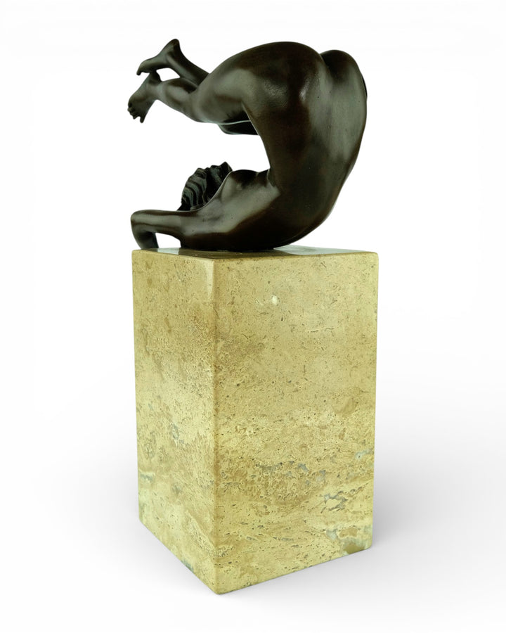 Bronze sculpture of a female in flowing pose