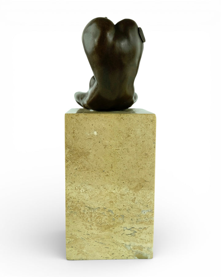 Bronze sculpture of a female in flowing pose