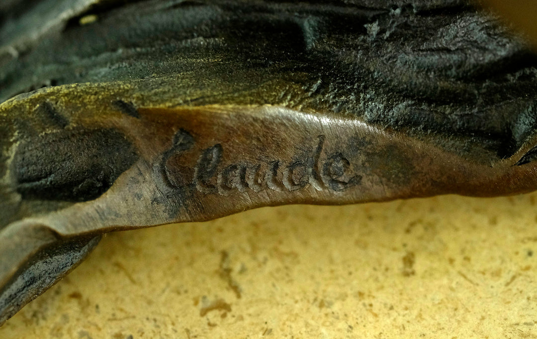 Bronze sculpture of a female in flowing pose