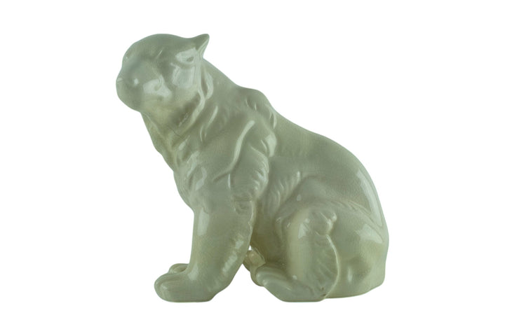 Porcelain sculpture of a sitting polar bear