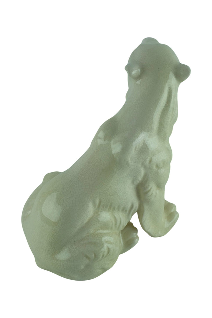 Porcelain sculpture of a sitting polar bear