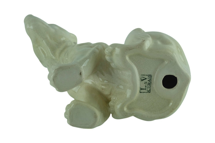 Porcelain sculpture of a sitting polar bear