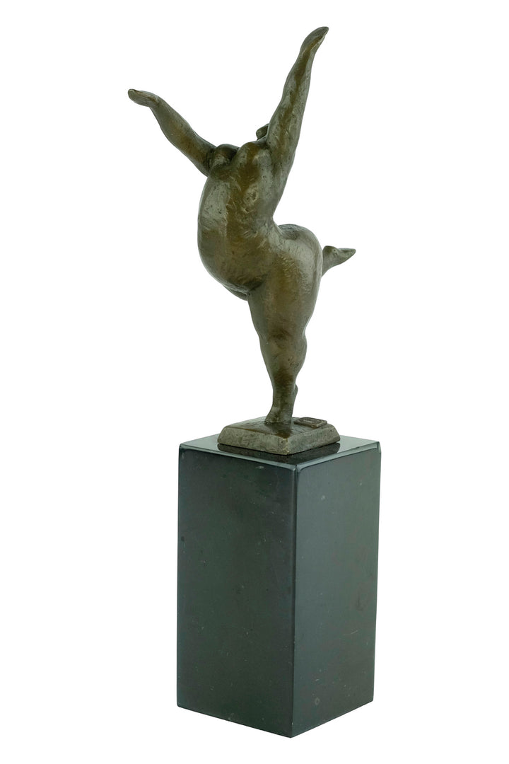 Bronze sculpture of a voluptuous female nude dancing freely