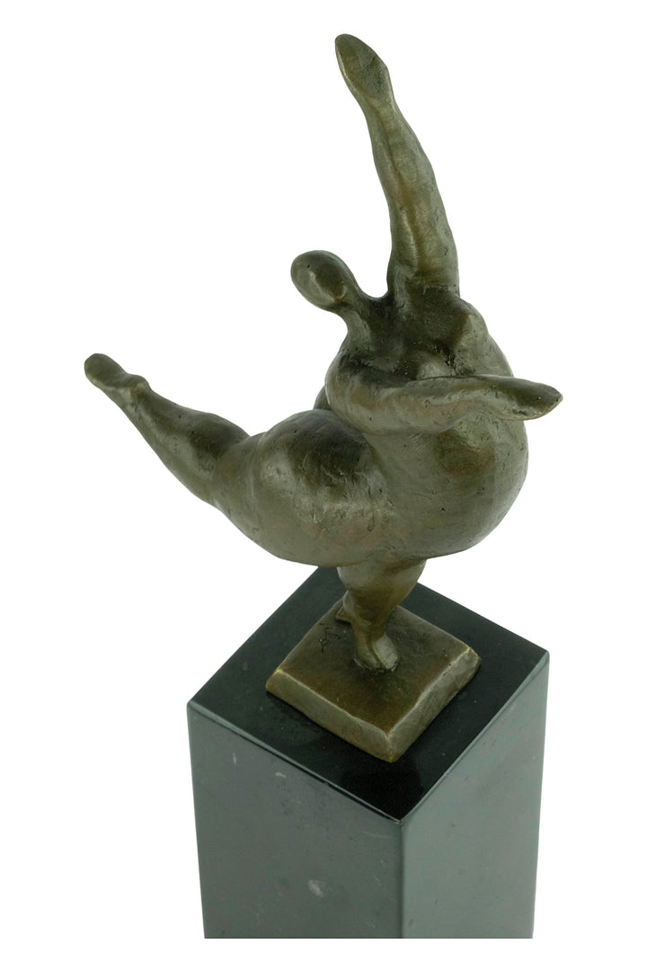 Bronze sculpture of a voluptuous female nude dancing freely