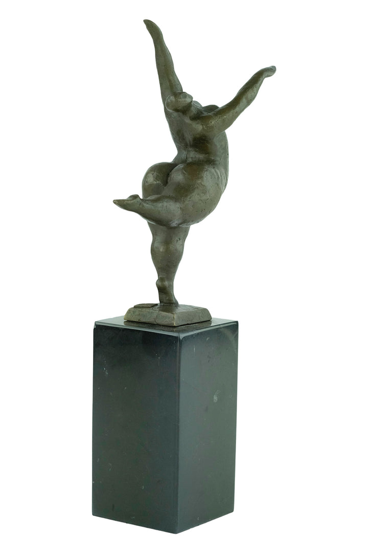 Bronze sculpture of a voluptuous female nude dancing freely