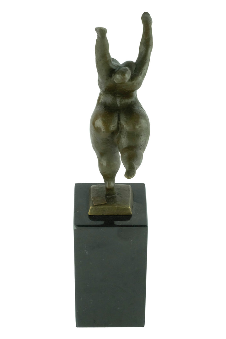 Bronze sculpture of a voluptuous female nude dancing freely
