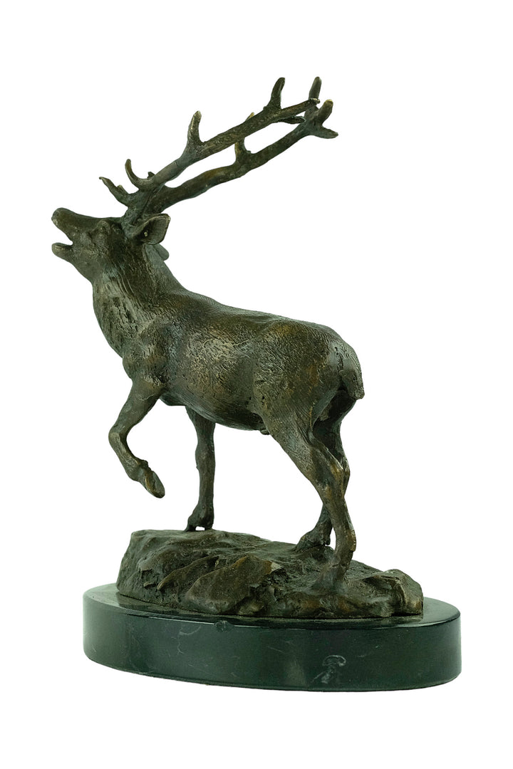 Bronze sculpture of a red deer bellowing