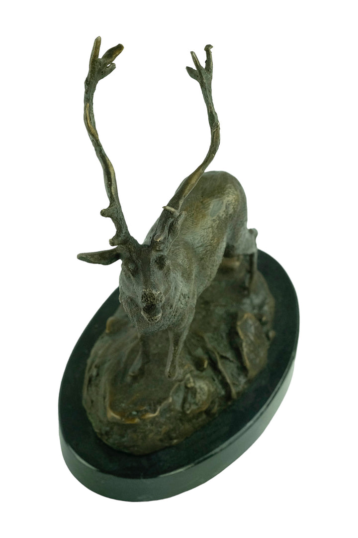 Bronze sculpture of a red deer bellowing