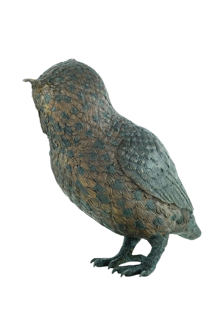 Bronze sculpture of a standing owl