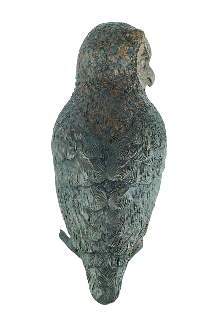 Bronze sculpture of a standing owl