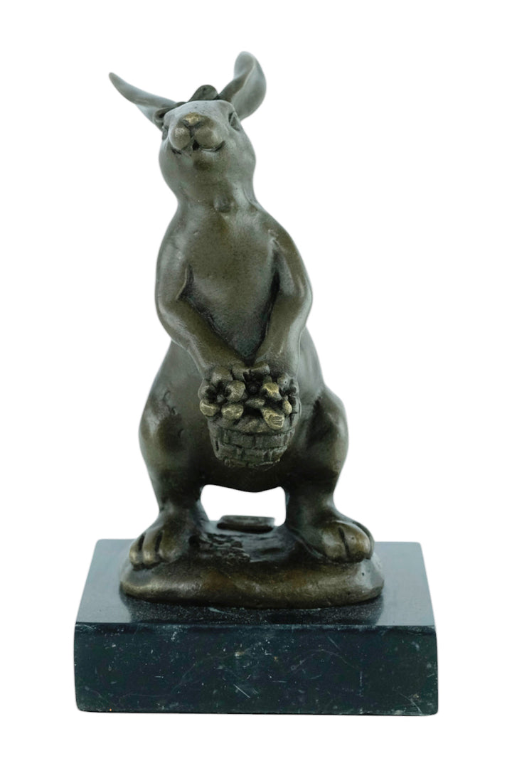Bronze sculpture of a bunny with a flower basket