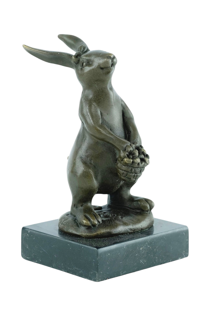 Bronze sculpture of a bunny with a flower basket
