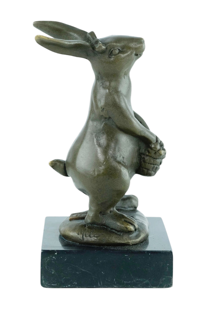Bronze sculpture of a bunny with a flower basket