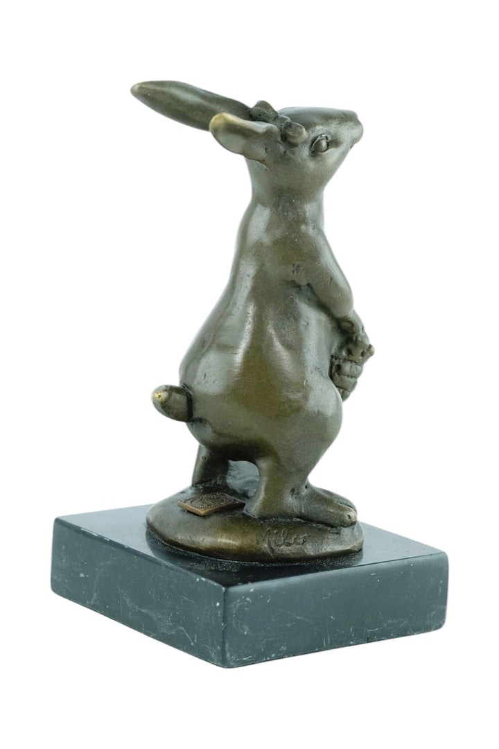 Bronze sculpture of a bunny with a flower basket