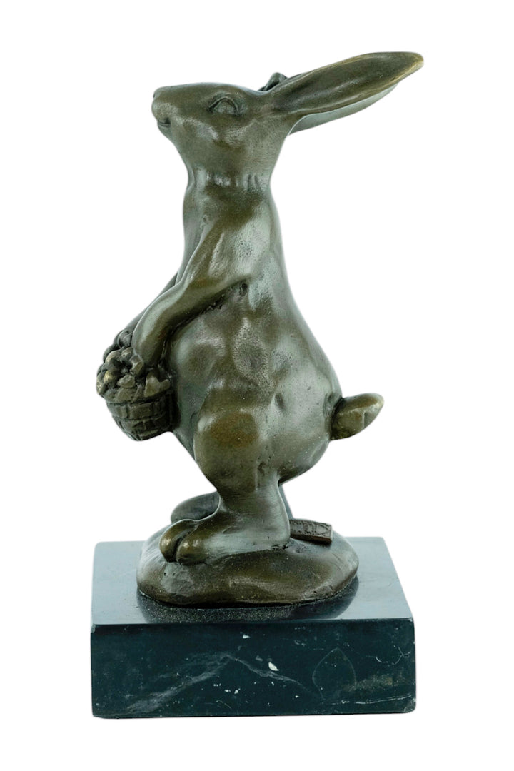 Bronze sculpture of a bunny with a flower basket