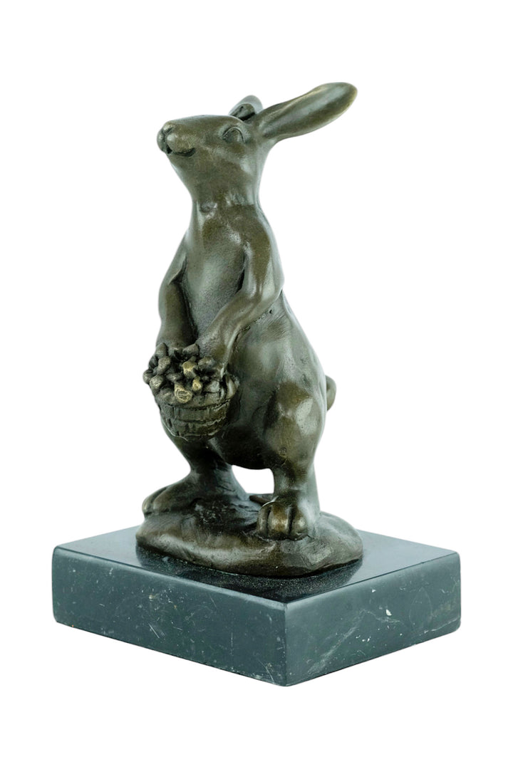 Bronze sculpture of a bunny with a flower basket