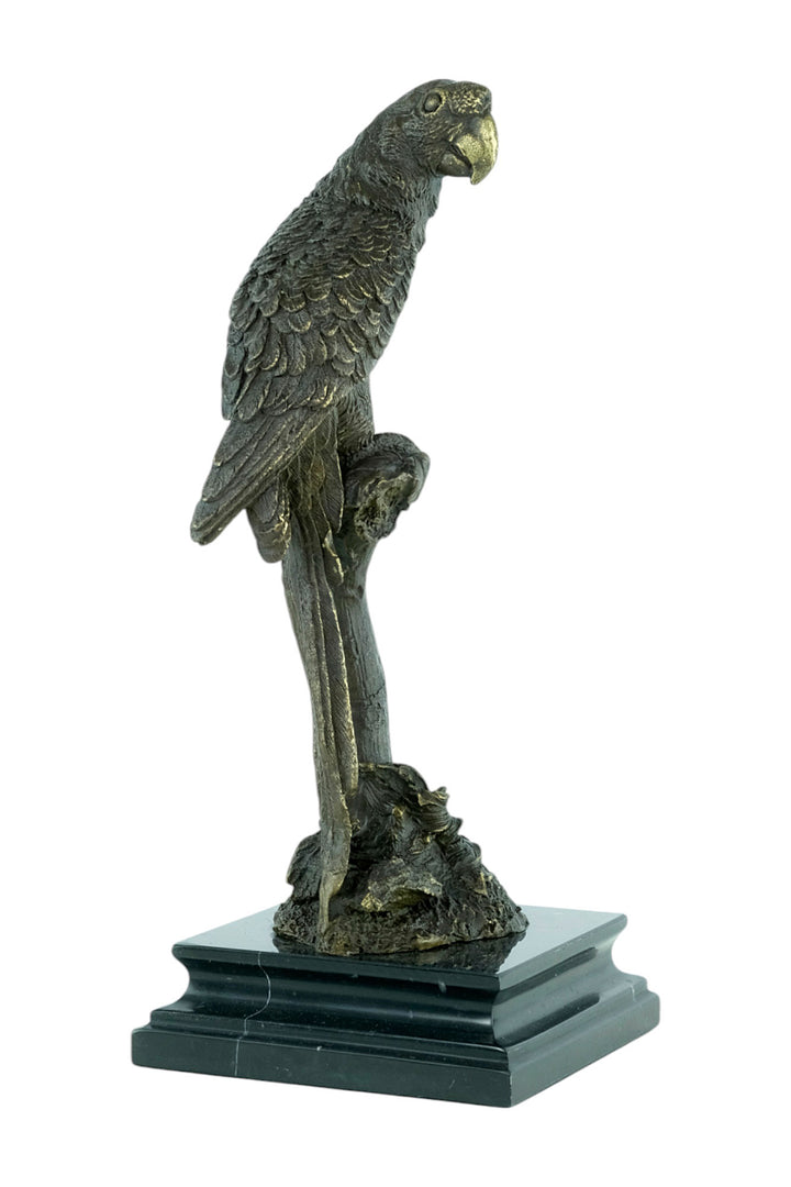 Bronze sculpture of a parrot sitting on a branch