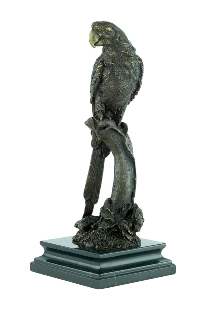 Bronze sculpture of a parrot sitting on a branch