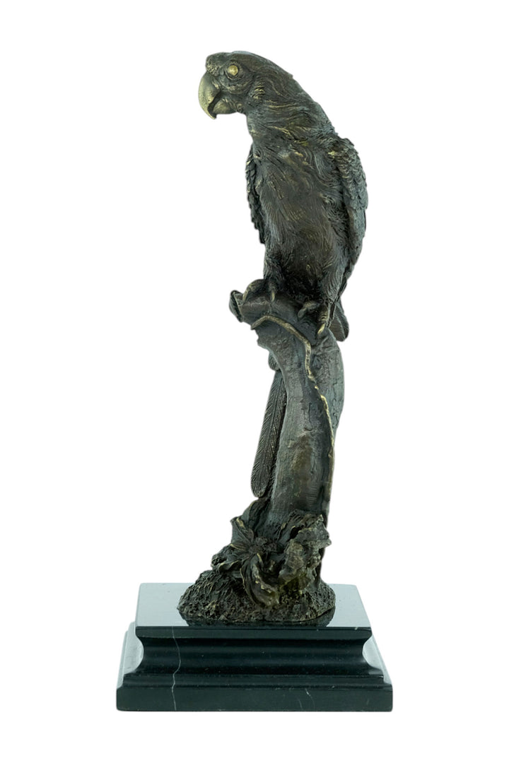 Bronze sculpture of a parrot sitting on a branch