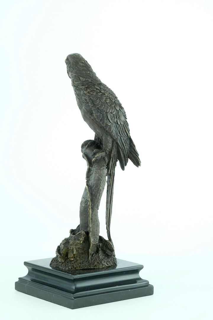 Bronze sculpture of a parrot sitting on a branch