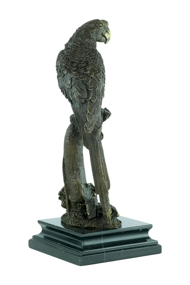Bronze sculpture of a parrot sitting on a branch