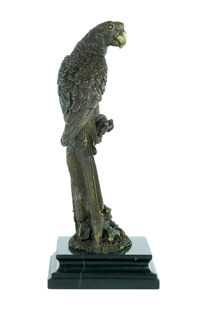 Bronze sculpture of a parrot sitting on a branch