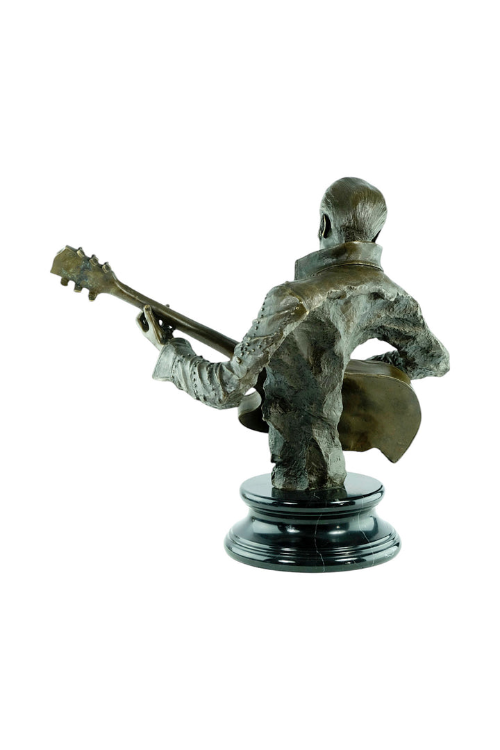 Large bronze sculpture of Elvis Presley with his guitar