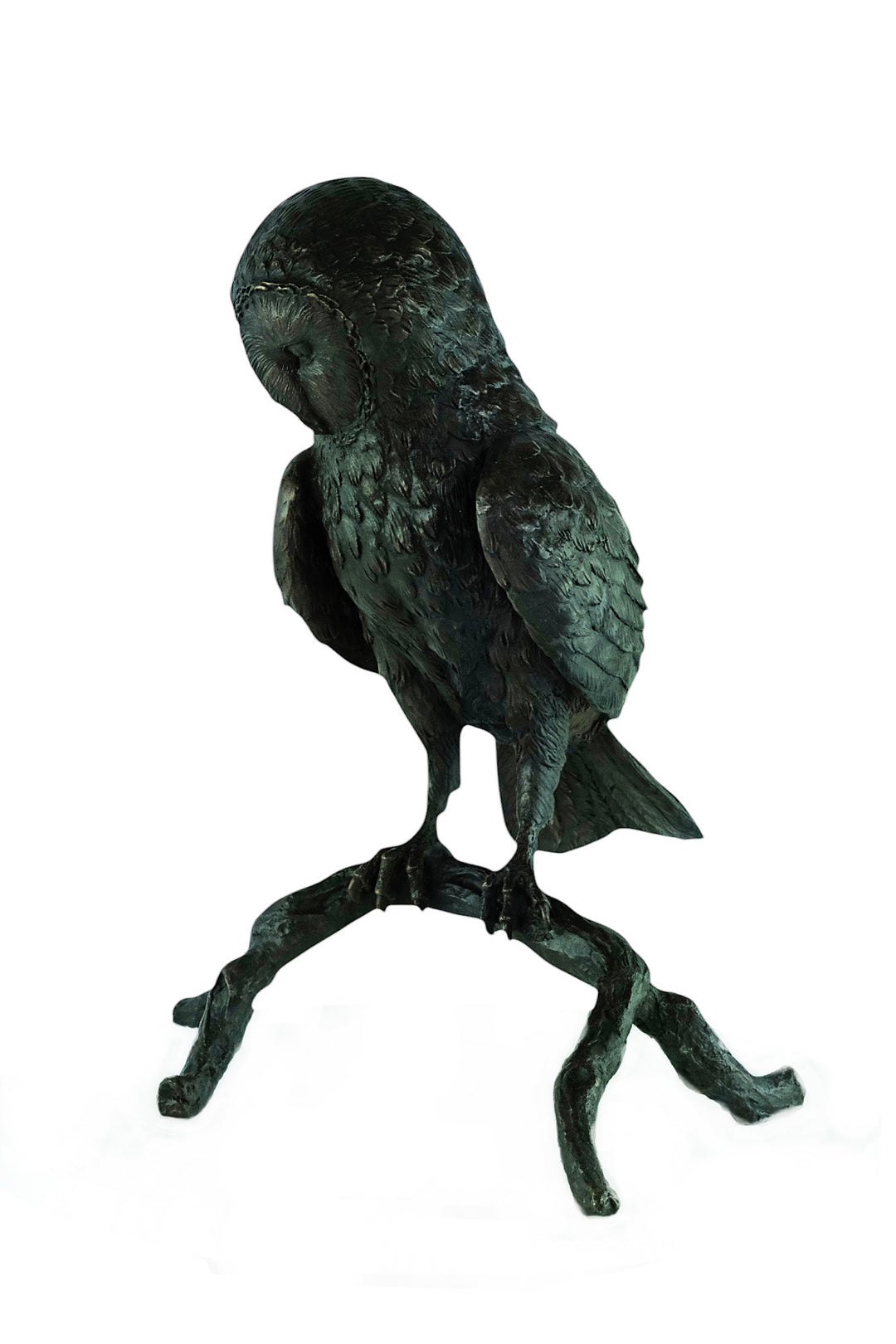 Large bronze sculpture of an owl sitting on a branch