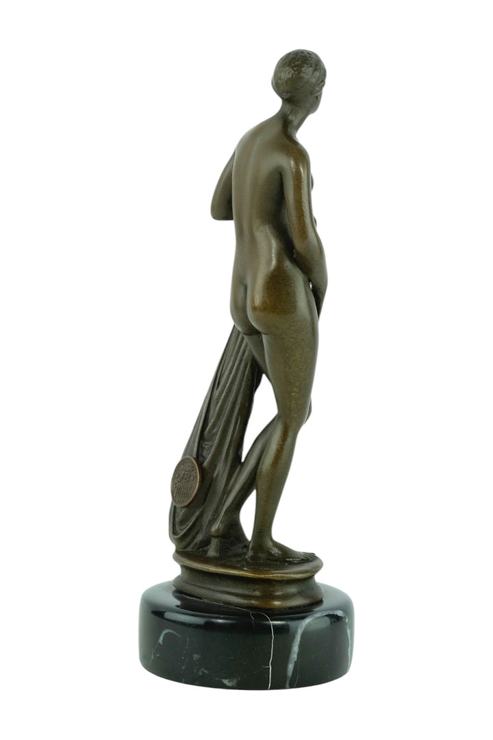 Bronze sculpture of a bathing female