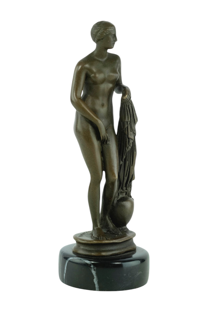 Bronze sculpture of a bathing female