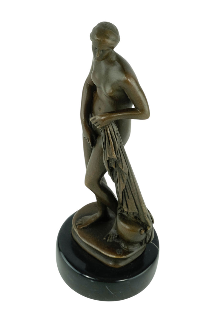Bronze sculpture of a bathing female