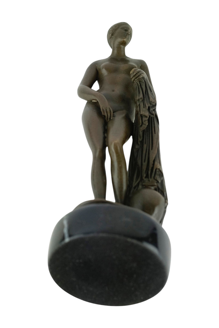 Bronze sculpture of a bathing female