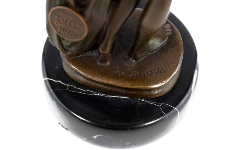 Bronze sculpture of a bathing female