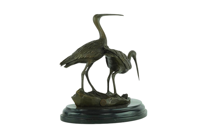Bronze sculpture of two black-tailed godwits