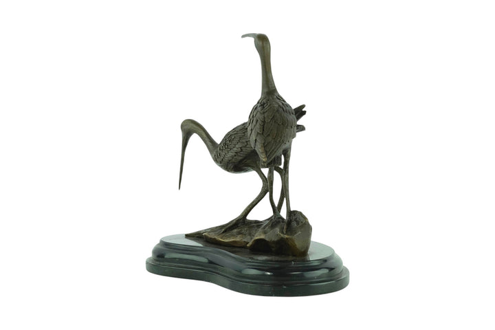 Bronze sculpture of two black-tailed godwits
