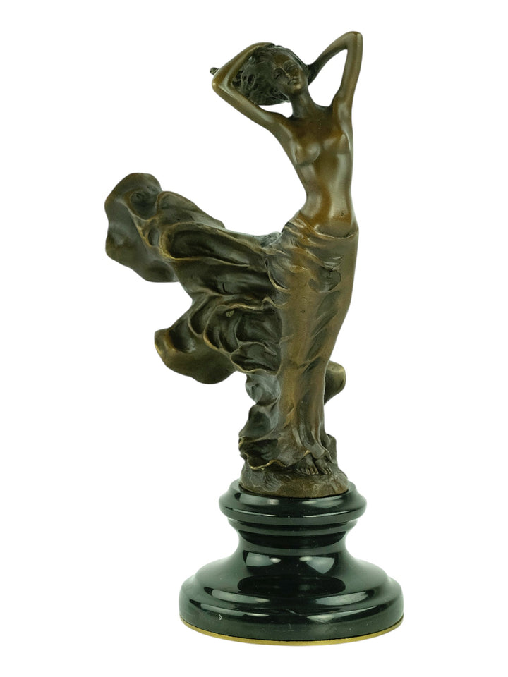 Bronze sculpture of a female in a swirling dress