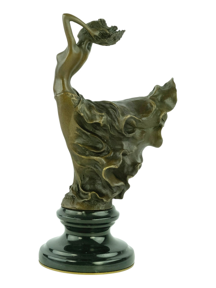 Bronze sculpture of a female in a swirling dress