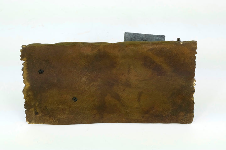 Bronze sculpture of a Quran scribe