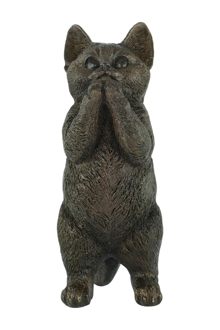 Bronze sculpture of a standing kitten