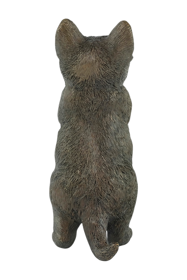 Bronze sculpture of a standing kitten