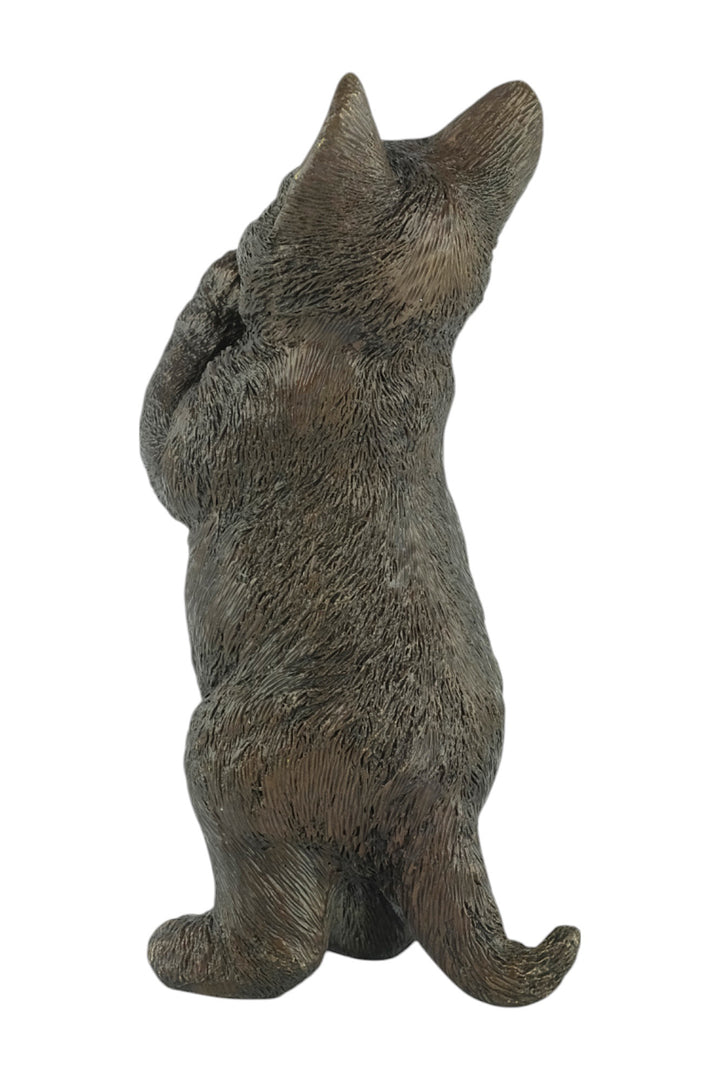 Bronze sculpture of a standing kitten