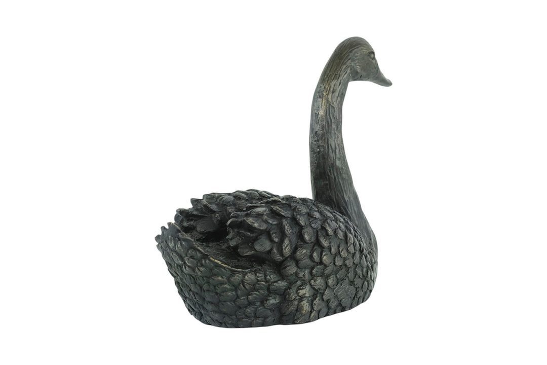 Bronze sculpture of a swimming swan
