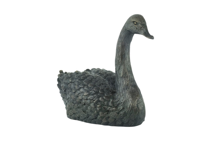 Bronze sculpture of a swimming swan