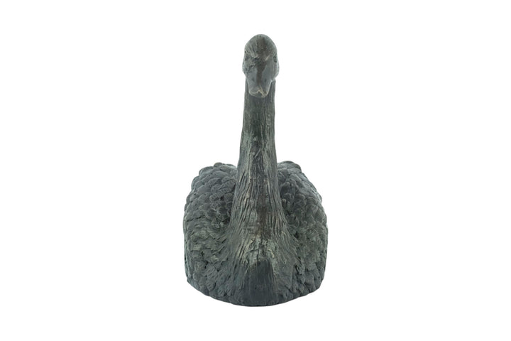 Bronze sculpture of a swimming swan