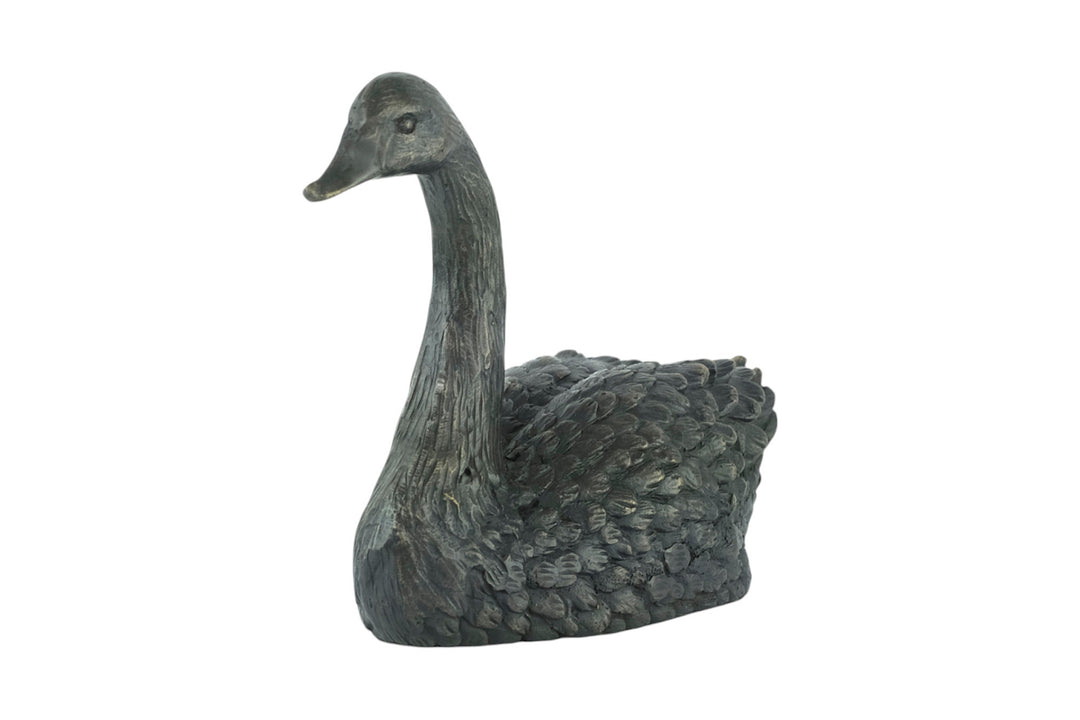 Bronze sculpture of a swimming swan