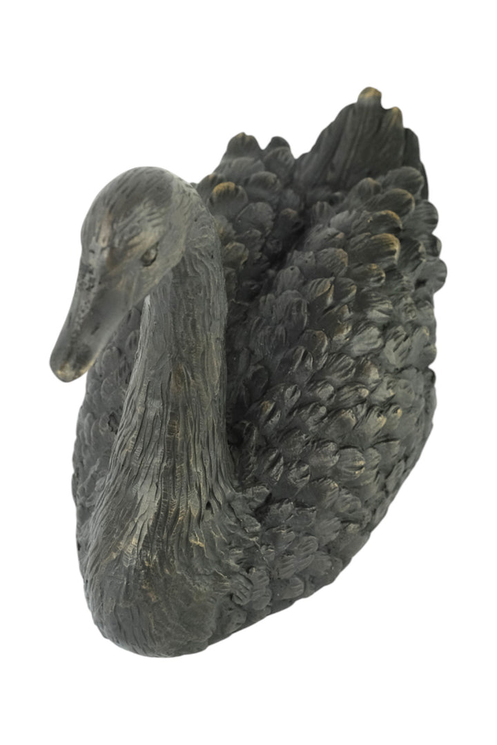 Bronze sculpture of a swimming swan