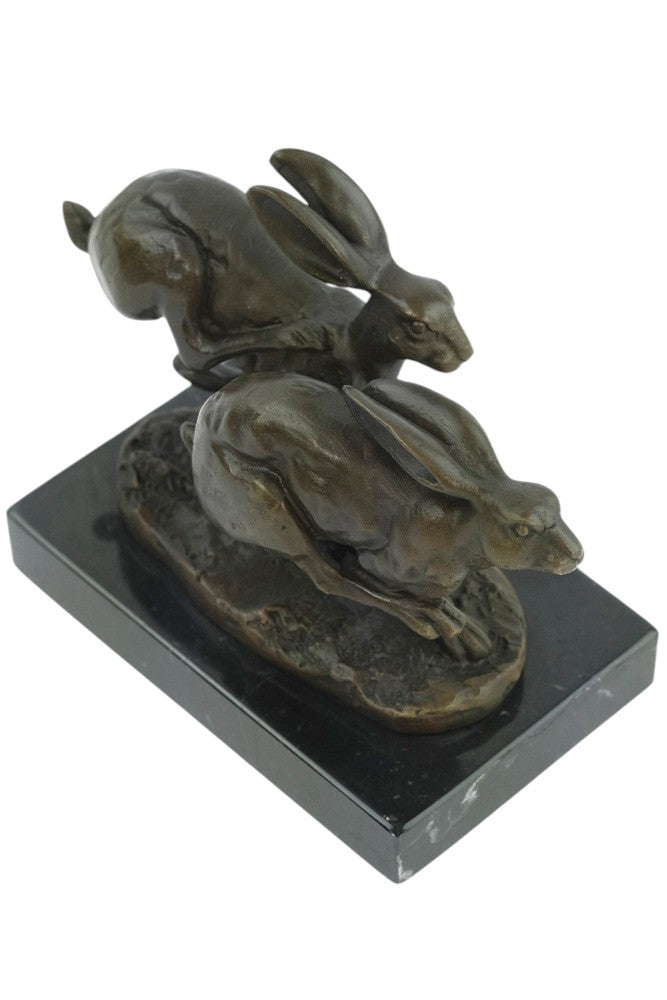 Bronze running hares sculpture